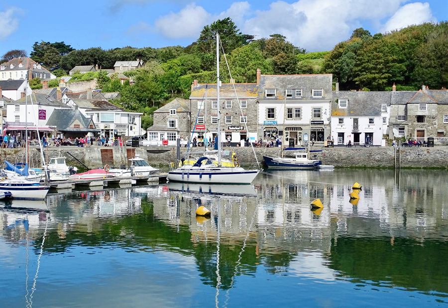 Padstow harbour, with boats moored along the quay